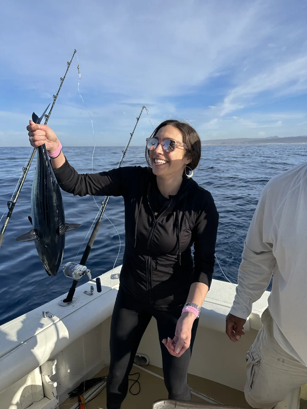 Showing a catch aboard a fishing boat.